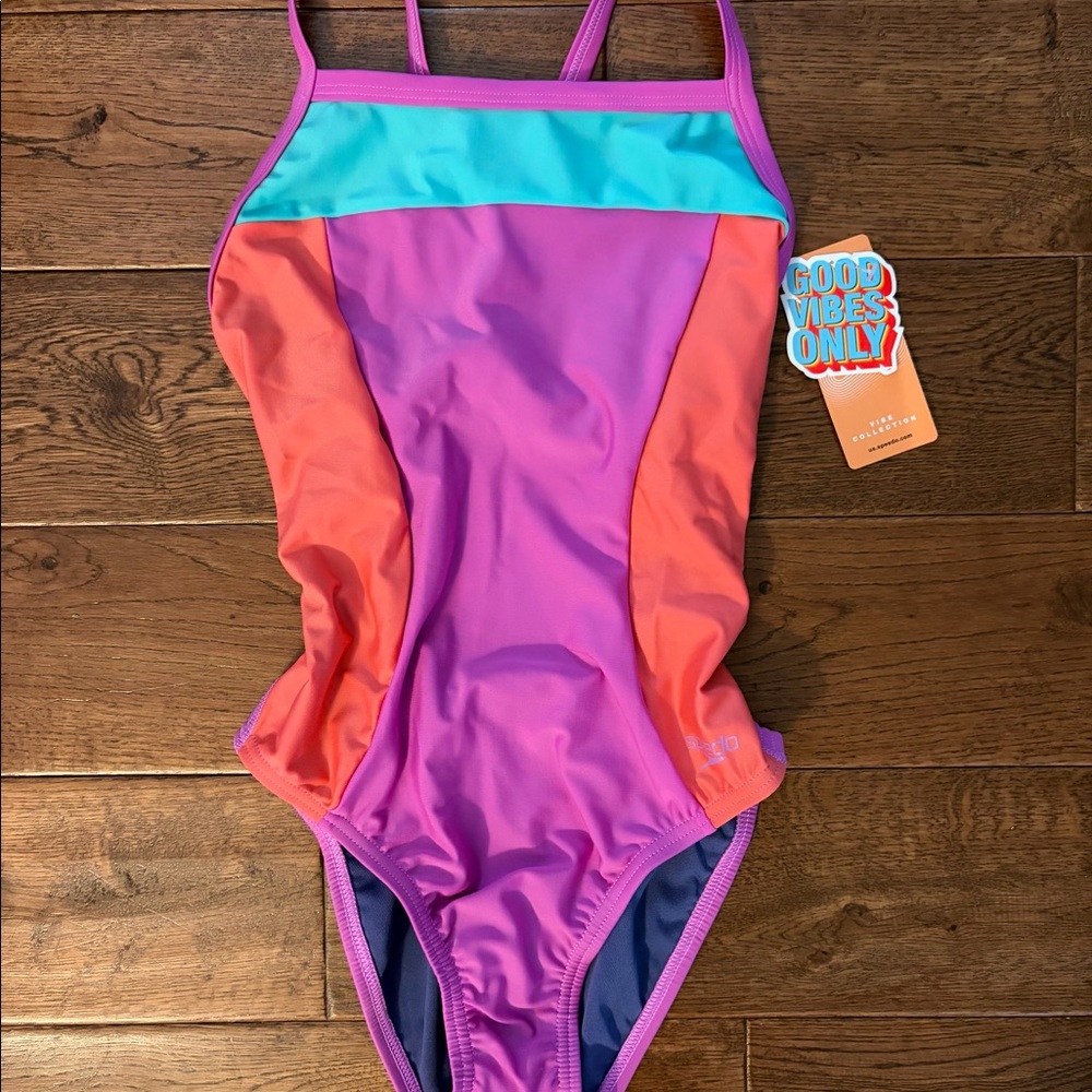 NWT Speedo color block one piece swim suit size 4 neon violet